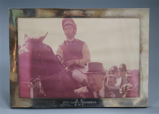 Horse Racing Interest: an Asprey & Co Ltd rectangular silver photograph frame with presentation inscription, 24.5cm x 34.5cm